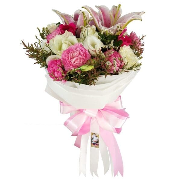 A mixed Bouquet of seasonal blooms in pink and white